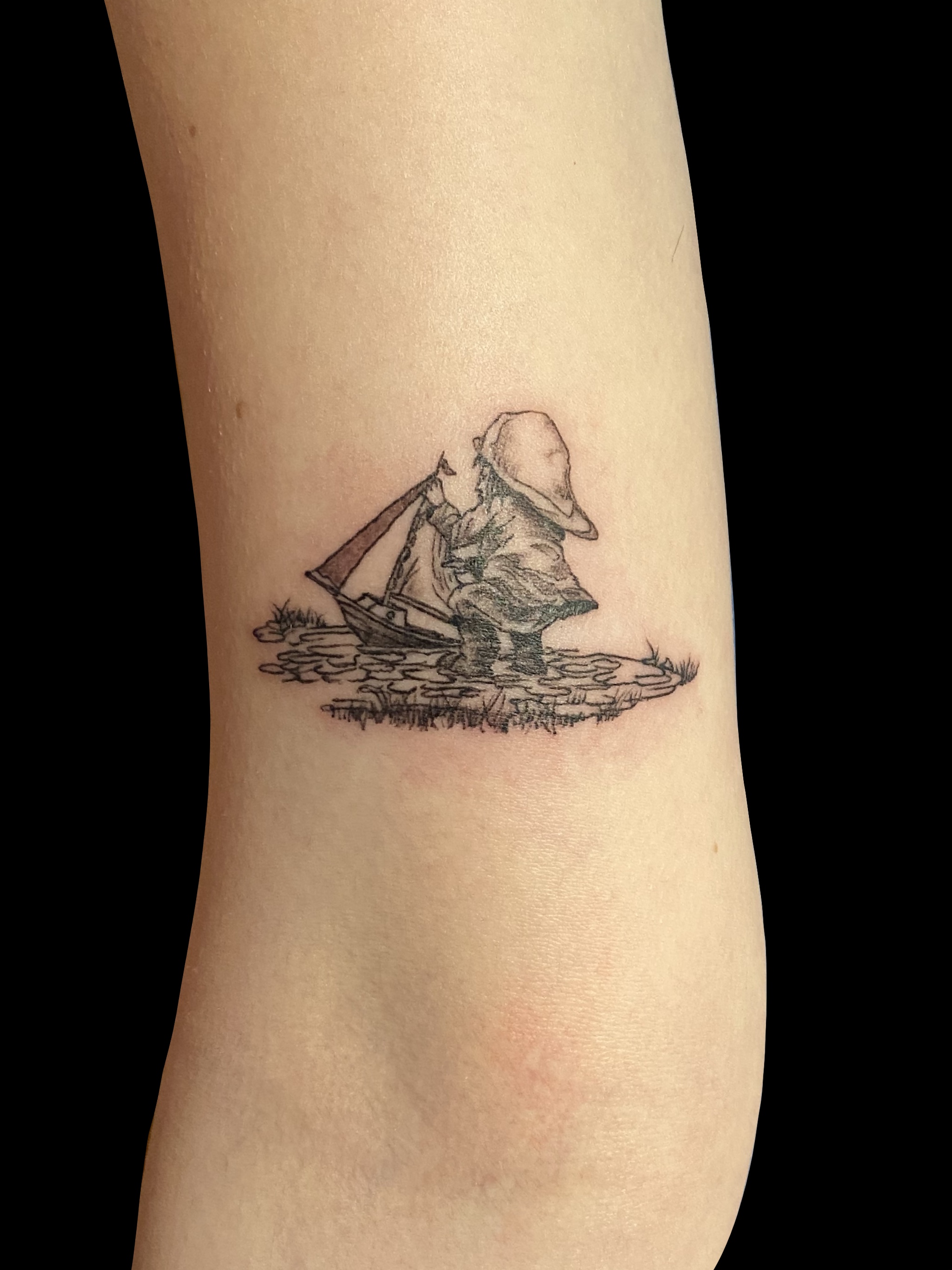 Fine line child playing with boat tattoo by Embodiment of Ink
